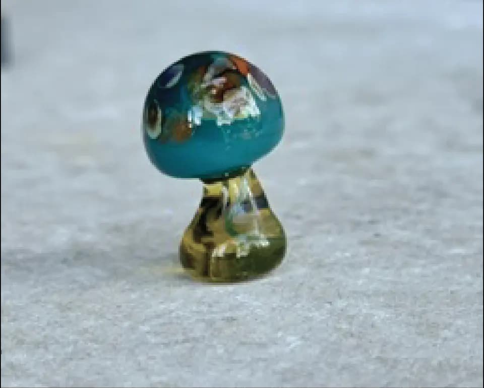 Teal glass mushroom